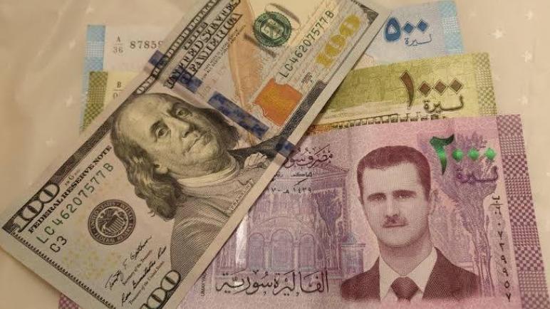 نظام الأسد ُيلزم كل شخص بتصريف 100 دولار عند دخوله سوريا