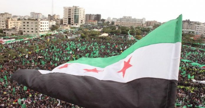 نضال شعبي واسع رافض لقرار تغيير علم الثورة السورية